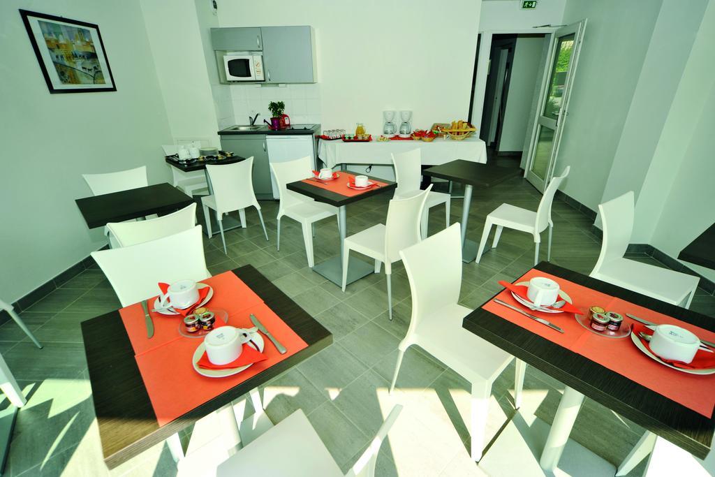 อัปปาร์ตซิตี้ เกรอนอบล์ เมล็อง Aparthotel เมย์ล็อง ภายนอก รูปภาพ